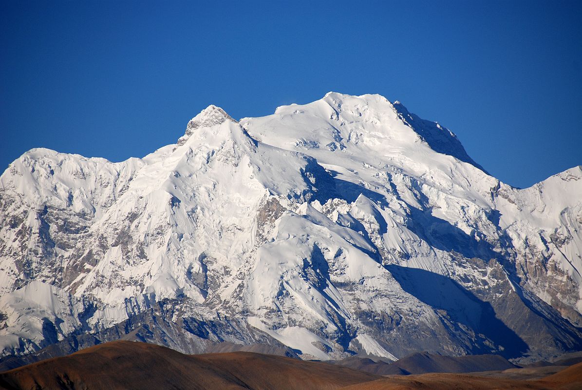 10 Pungpa Ri, Phola Gangchen And Shishapangma From Tong La Shishapangma (8012m) is the star mountain visible from the Tong La (5143m) between Nyalam and Tingri. Pungpa Ri is on the far left and Phola Gangchen is the peak just to left of centre.
